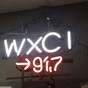 Represent - WXCI logo