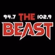 94.7/102.9 The Beast - WOZZ logo